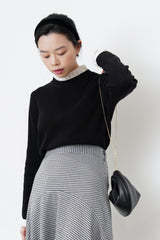 Black knit top w/ contrast pleats fringe