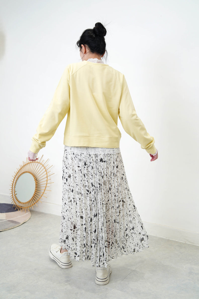 Pastel yellow pullover in crop cut
