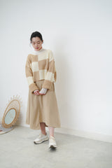 Bold checked sweater in boat neck