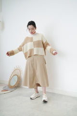 Bold checked sweater in boat neck