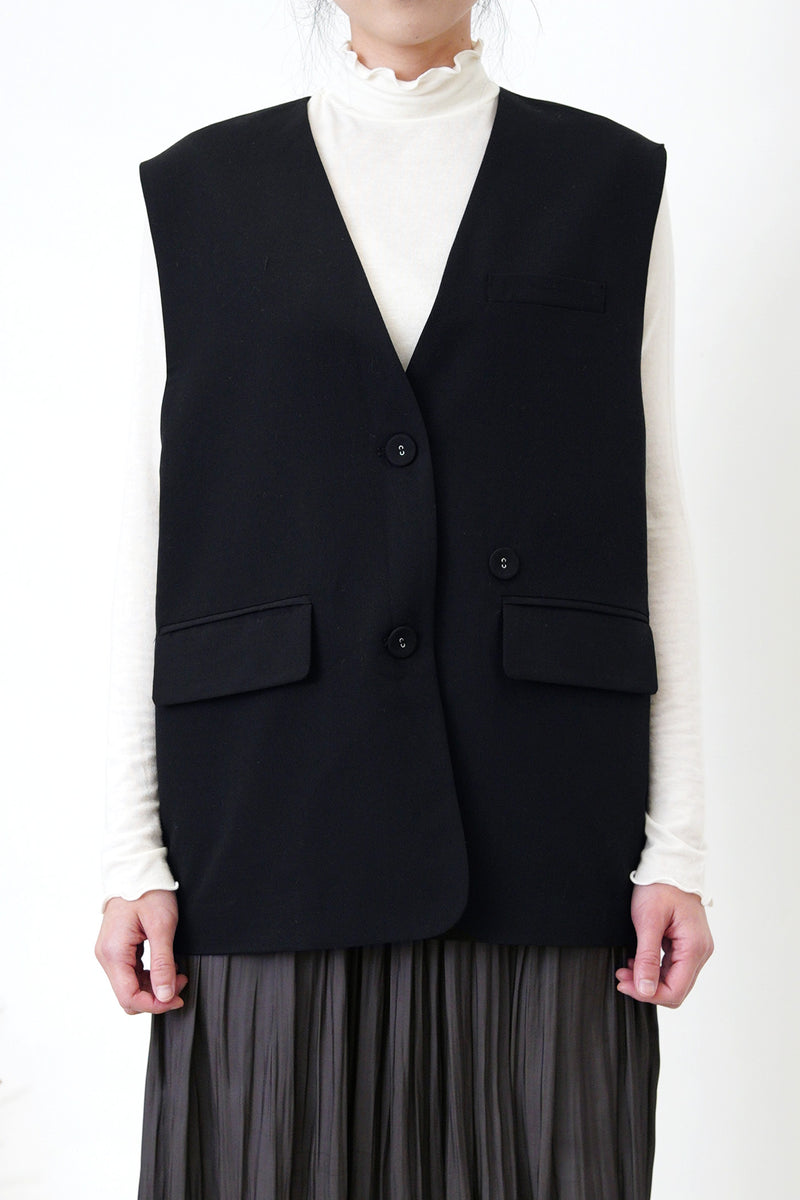Black vest w/  strap detail