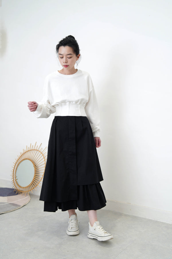 White pullover in corset hem