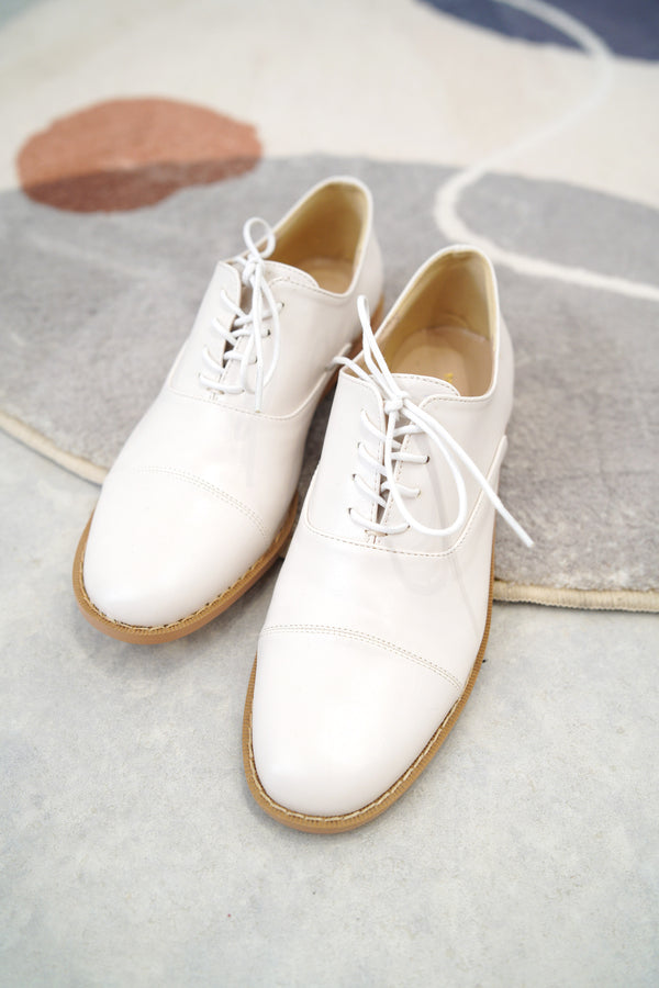 Nude lace up shoes