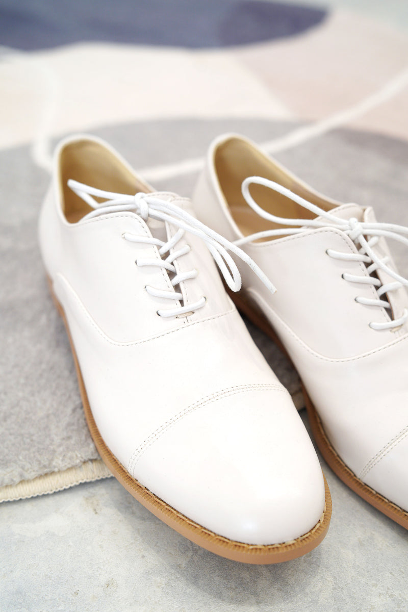 Nude lace up shoes