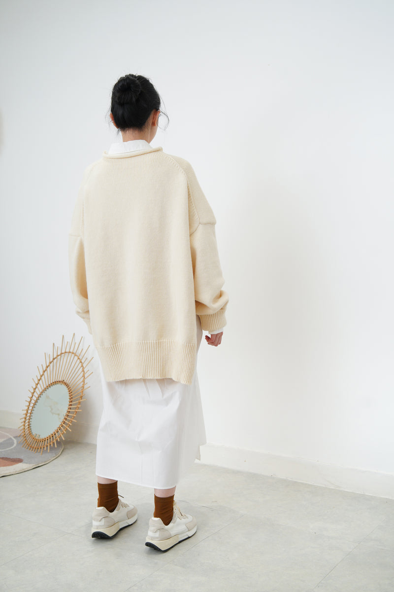 Ivory oversize sweater in split hem