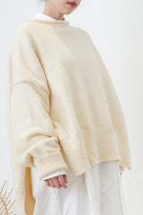 Ivory oversize sweater in split hem