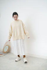 Ivory oversize sweater in split hem