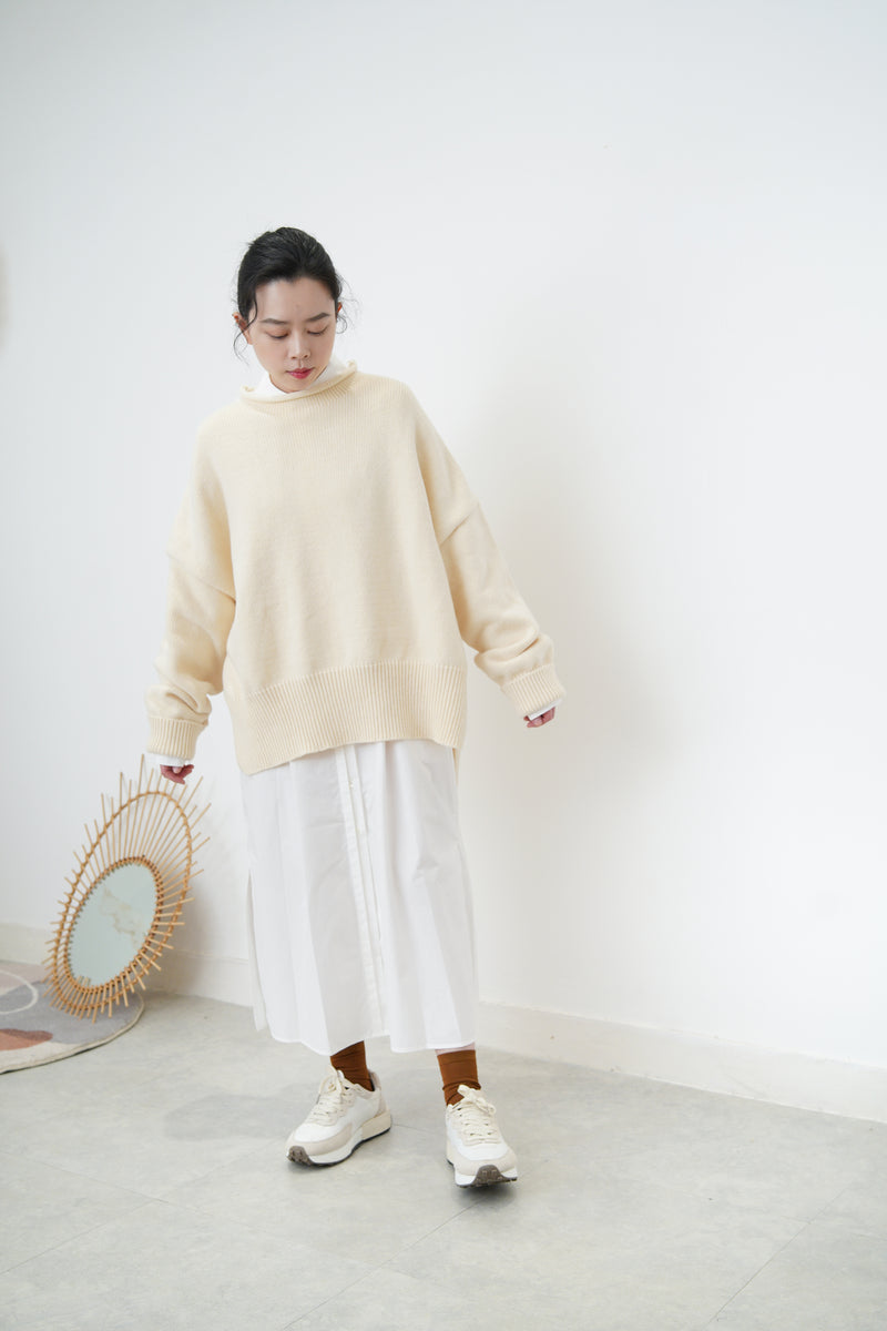 Ivory oversize sweater in split hem