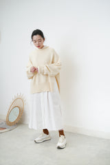 Ivory oversize sweater in split hem