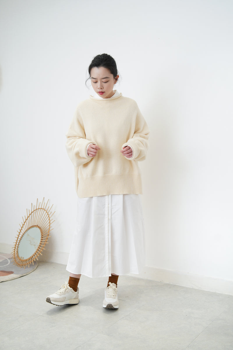 Ivory oversize sweater in split hem
