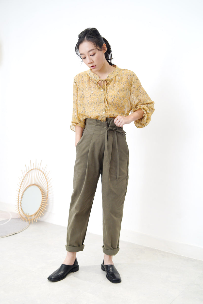 Khaki trousers w/ string details