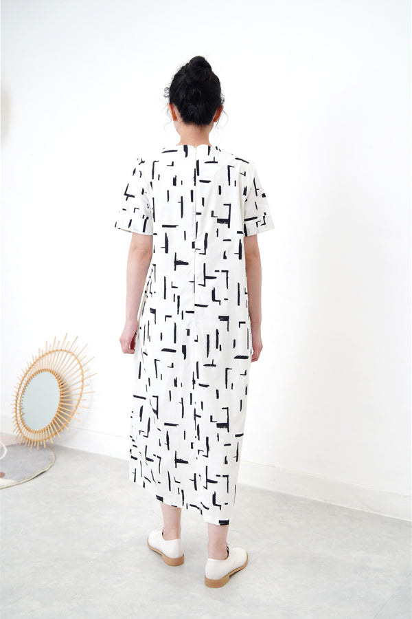 White dress in brush stroke pattern