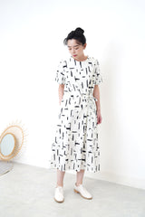 White dress in brush stroke pattern