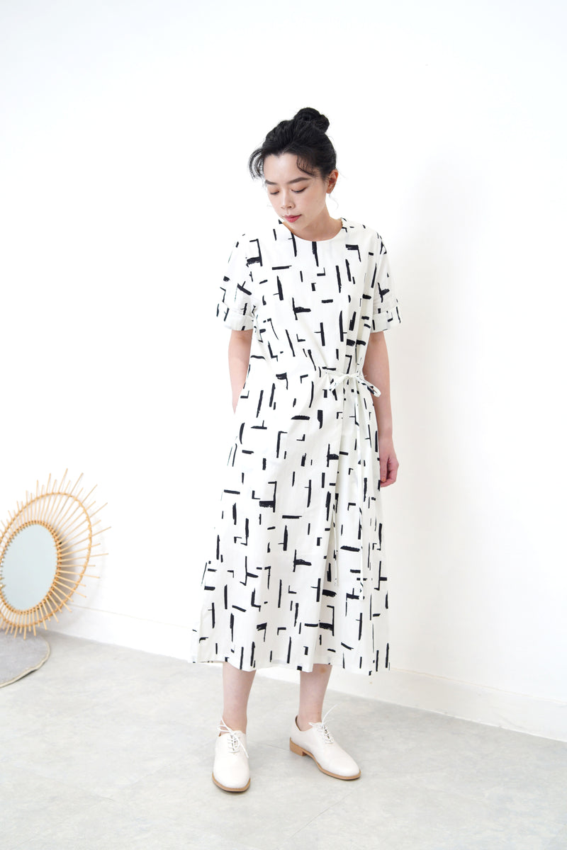 White dress in brush stroke pattern