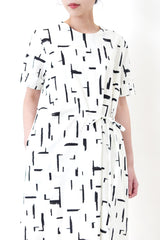 White dress in brush stroke pattern