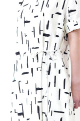 White dress in brush stroke pattern