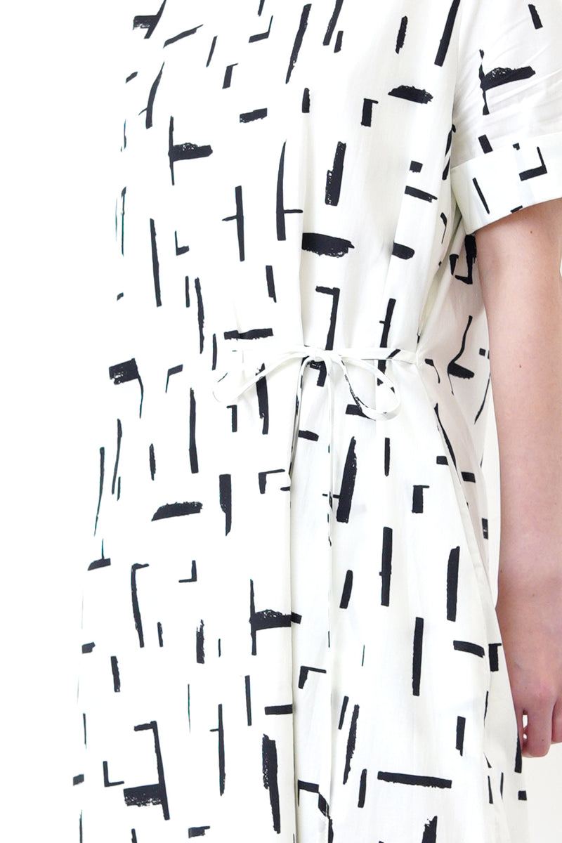 White dress in brush stroke pattern
