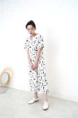 White dress in brush stroke pattern