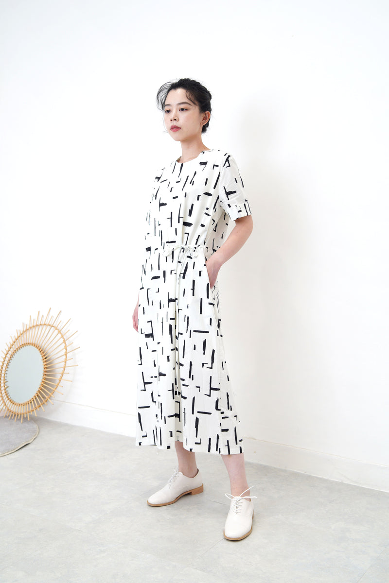 White dress in brush stroke pattern