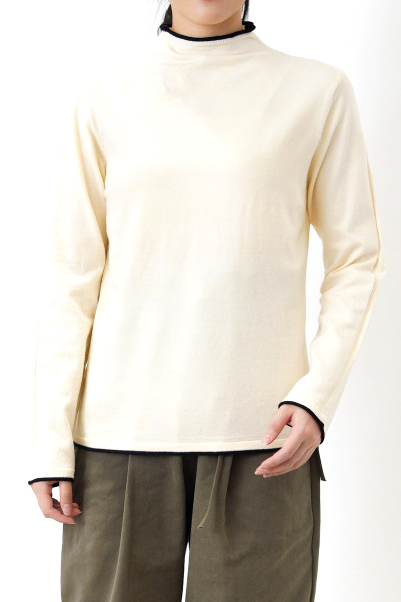 Cream funnel neck top in contrast trimmed