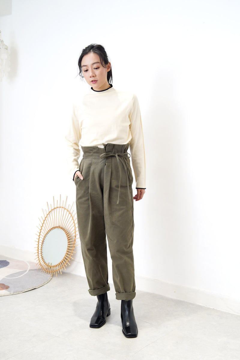 Cream funnel neck top in contrast trimmed