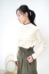 Cream funnel neck top in contrast trimmed