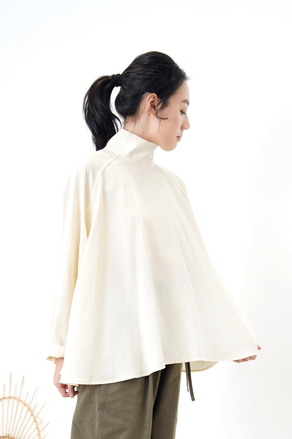 2 ways cream blouse in flare cut