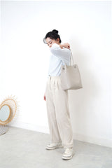 Grey leather tote in round thin strap