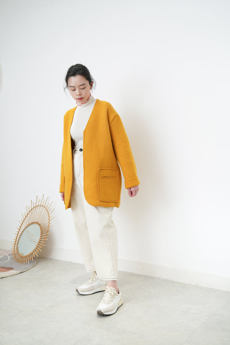Orange knit jacket w/ waist strap