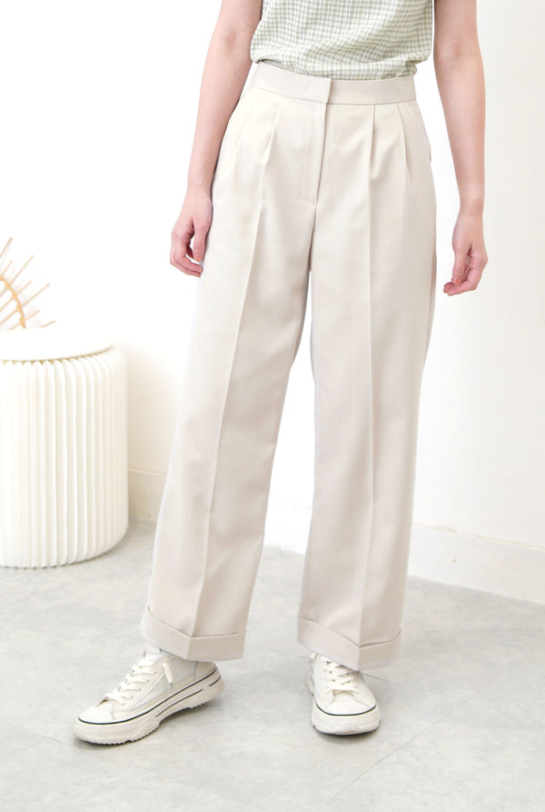 Light grey trousers in flip hem