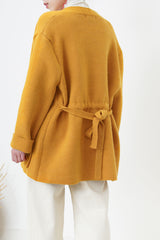 Orange knit jacket w/ waist strap