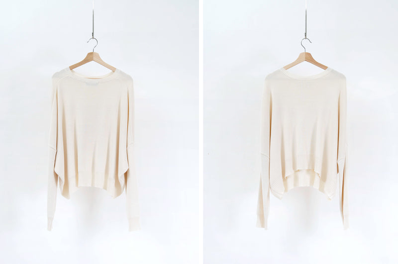 Cream sweater in loose cut