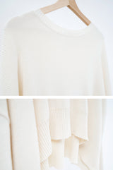 Cream sweater in loose cut