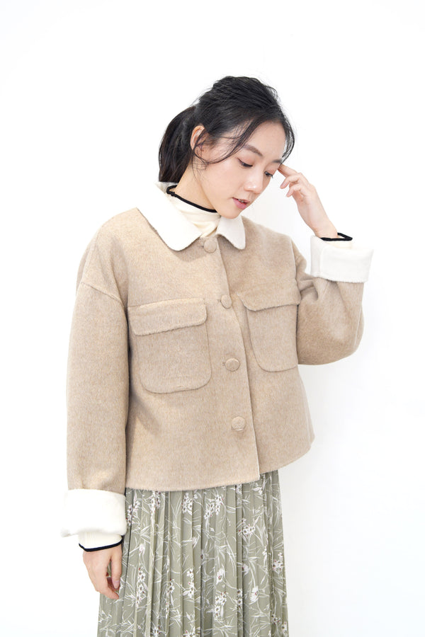 Beige handmade wool jacket in contrast collar