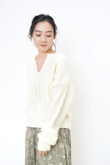 Ivory v neck sweater in twist pattern