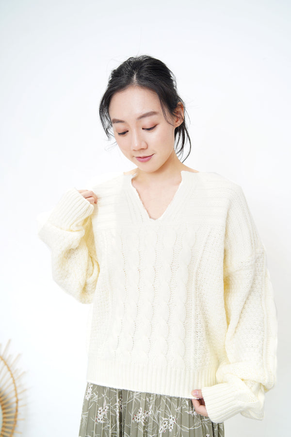 Ivory v neck sweater in twist pattern