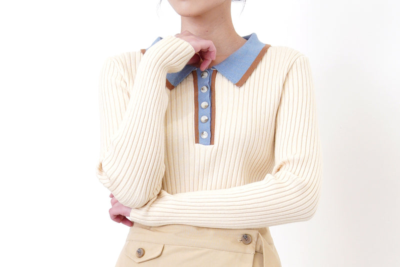 Light beige knit top w/ blue polo collar