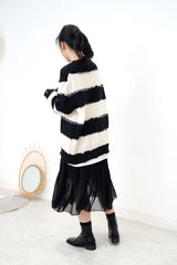 Black stripes oversize sweater in ripped details