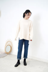 Cream knit top w/ pleats detail back