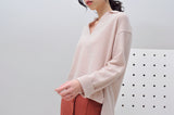 Light pink wool sweater in polo cut