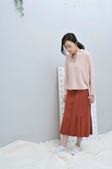 Light pink wool sweater in polo cut