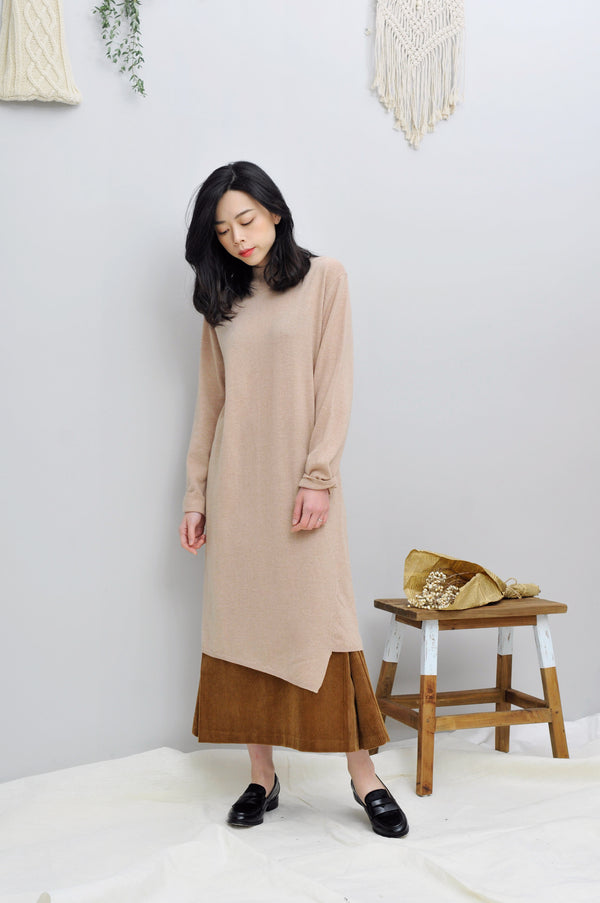 Beige knit dress in asymmetric hem