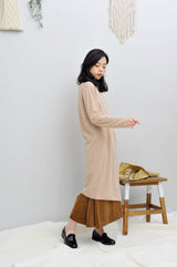 Beige knit dress in asymmetric hem