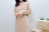 Beige knit dress in asymmetric hem